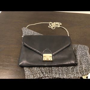 Black leather Loeffler Randall envelope clutch